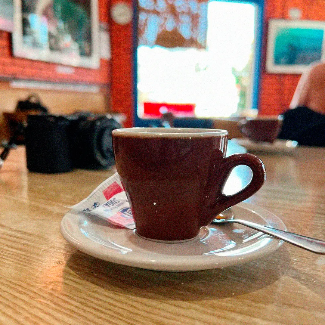a cup of coffee on a saucer